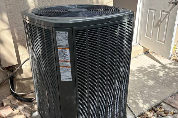 Trane condenser unit installed beside a home in Okeechobee, FL